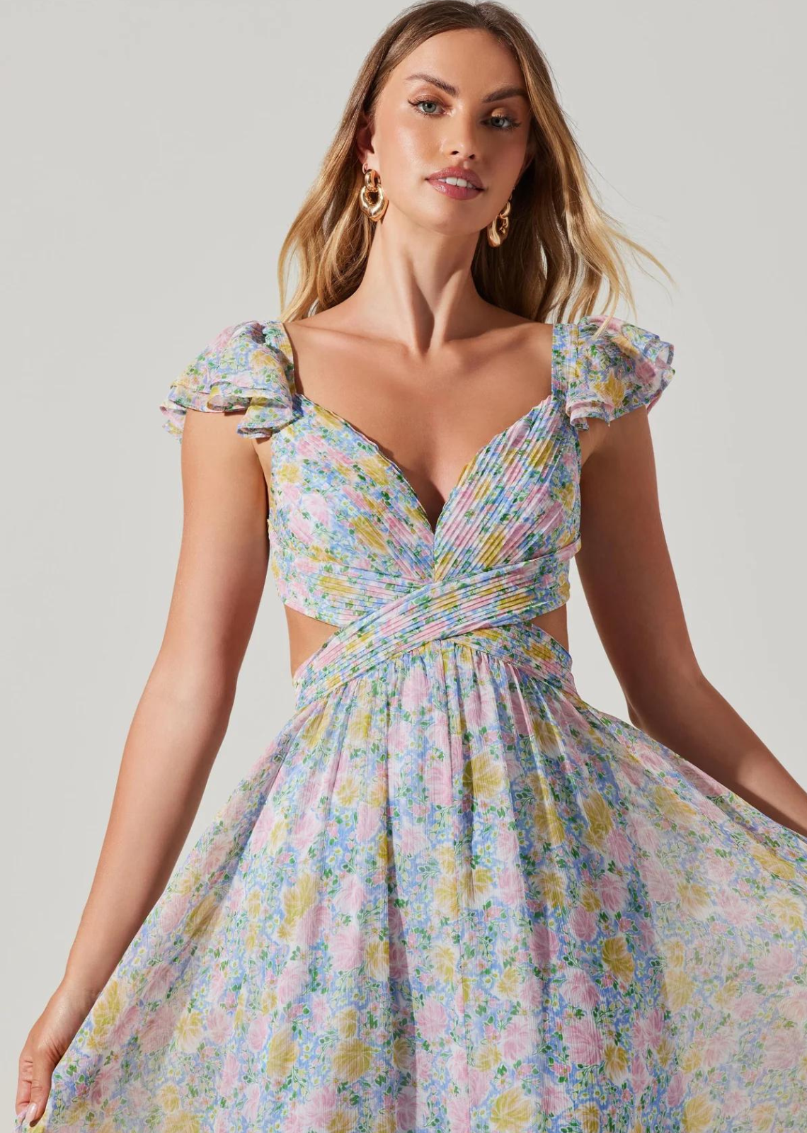 ASTR The Label Primrose Floral Maxi Dress.  Sweetheart neckline Pleated bodice Cutout accents Strappy back design Short, ruffle sleeves Concealed back zip closure