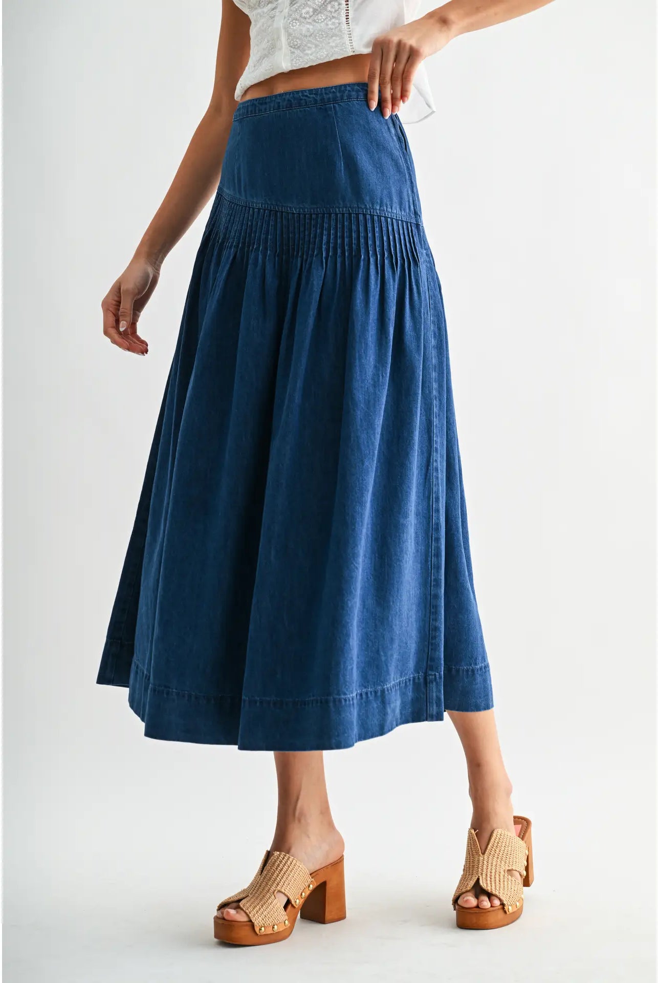 Heritage Midi Denim Skirt in classic blue denim, featuring a high-waisted fit and softly flared silhouette.