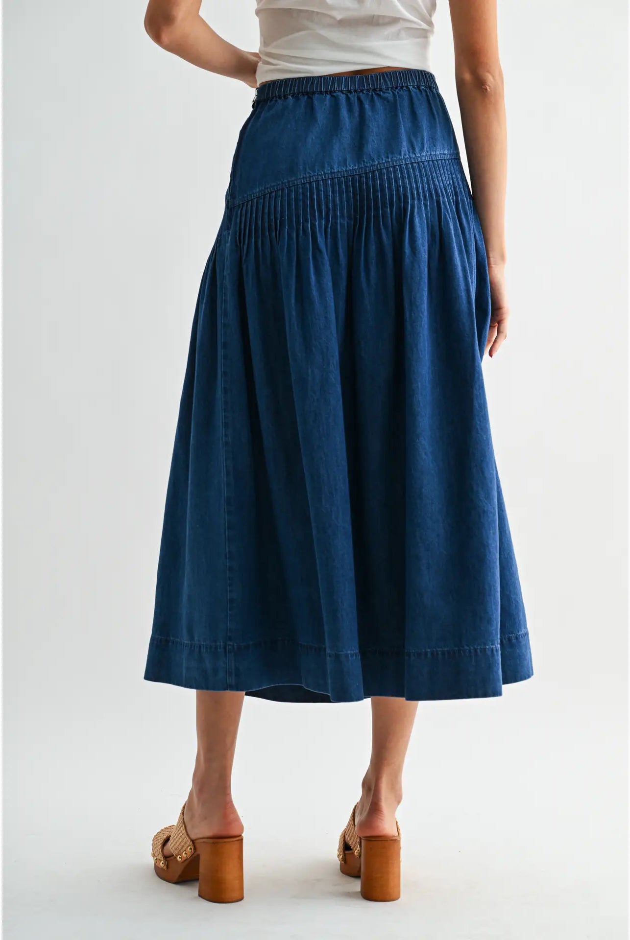 Heritage Midi Denim Skirt in classic blue denim, featuring a high-waisted fit and softly flared silhouette.