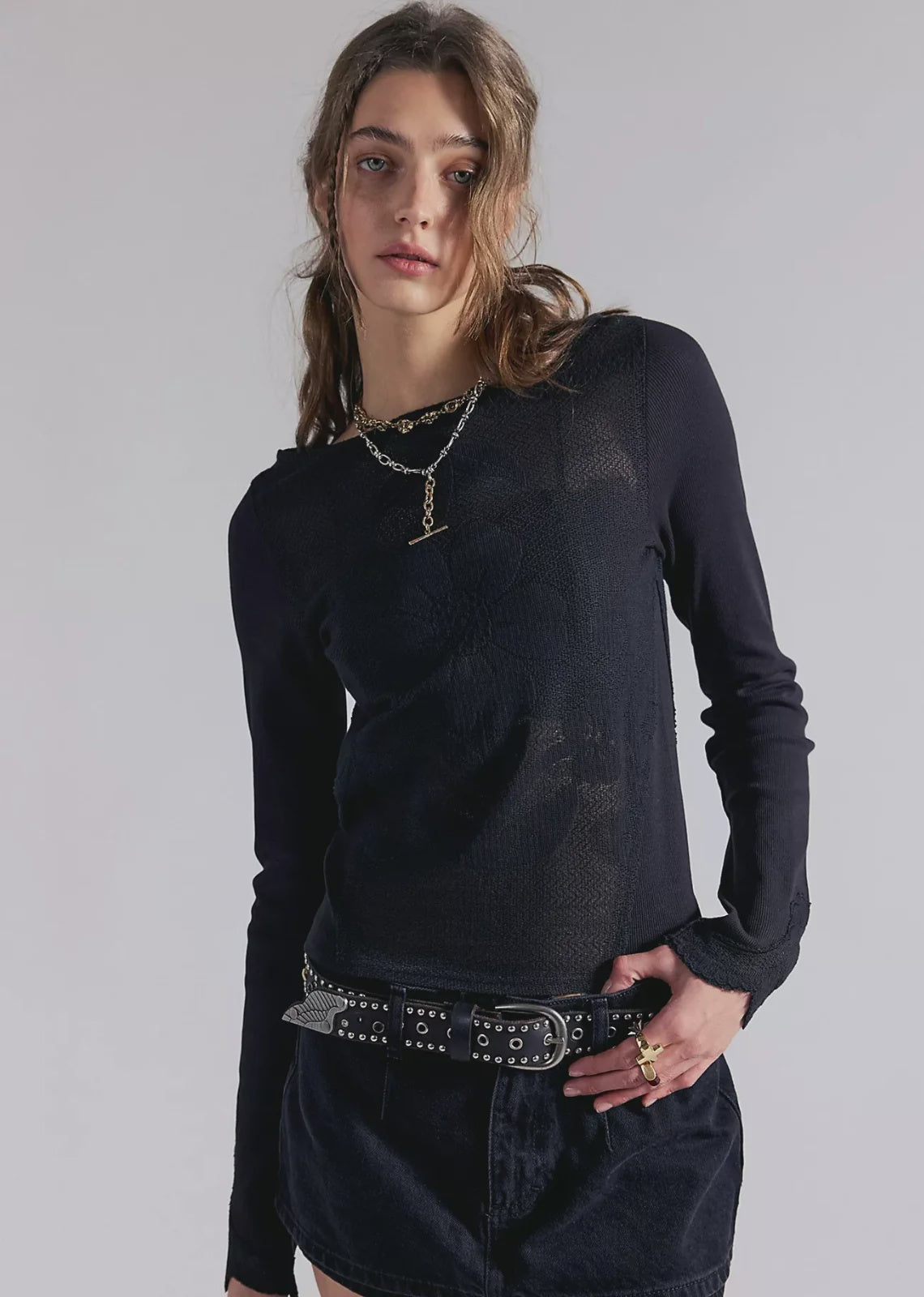 Deliah Long Sleeve top featuring a softly draped off-the-shoulder neckline, long fitted sleeves, and a flattering body-skimming silhouette with an elegant, feminine finish.