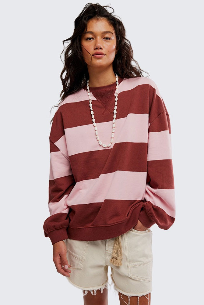 woman wearing strawberry wine combo striped oversized crew