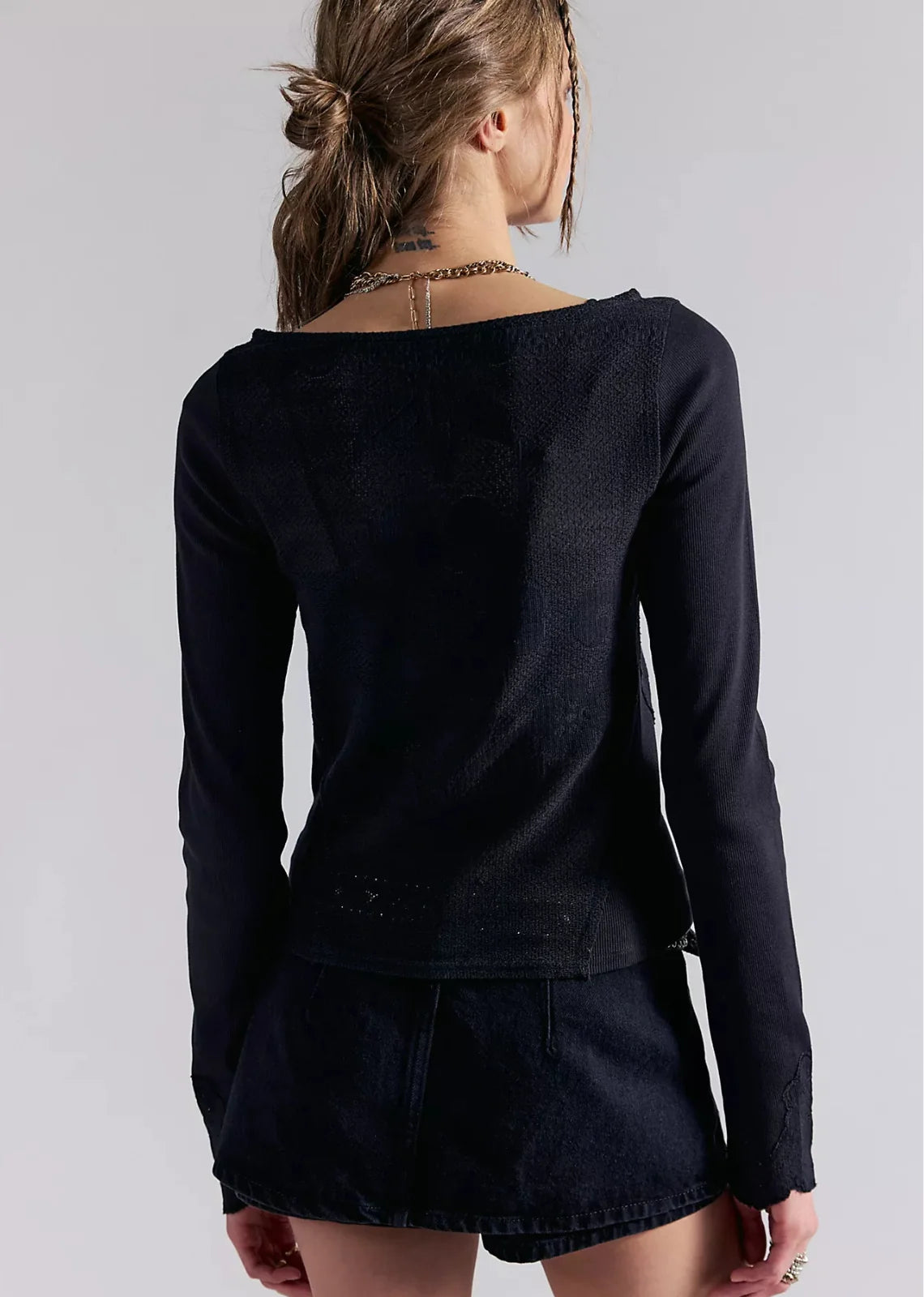 Deliah Long Sleeve top featuring a softly draped off-the-shoulder neckline, long fitted sleeves, and a flattering body-skimming silhouette with an elegant, feminine finish.