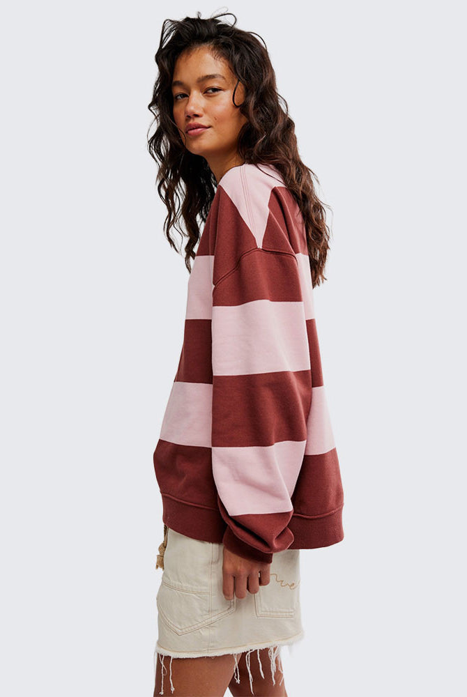 woman wearing strawberry wine combo striped oversized crew