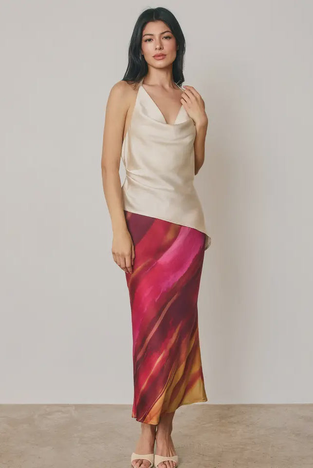 Golden Hour A-line maxi skirt in a watercolor-inspired stripe print with a smooth satin finish, featuring a hidden elastic waistband, pull-on design, and partial lining.