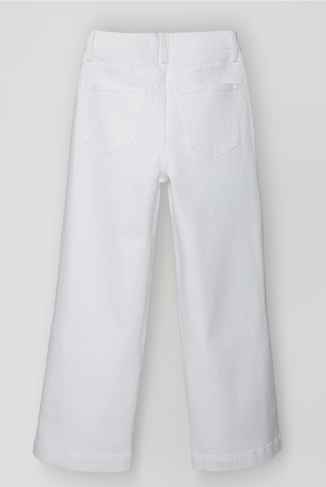 White pants on a light gray background Lee & Me Boutique