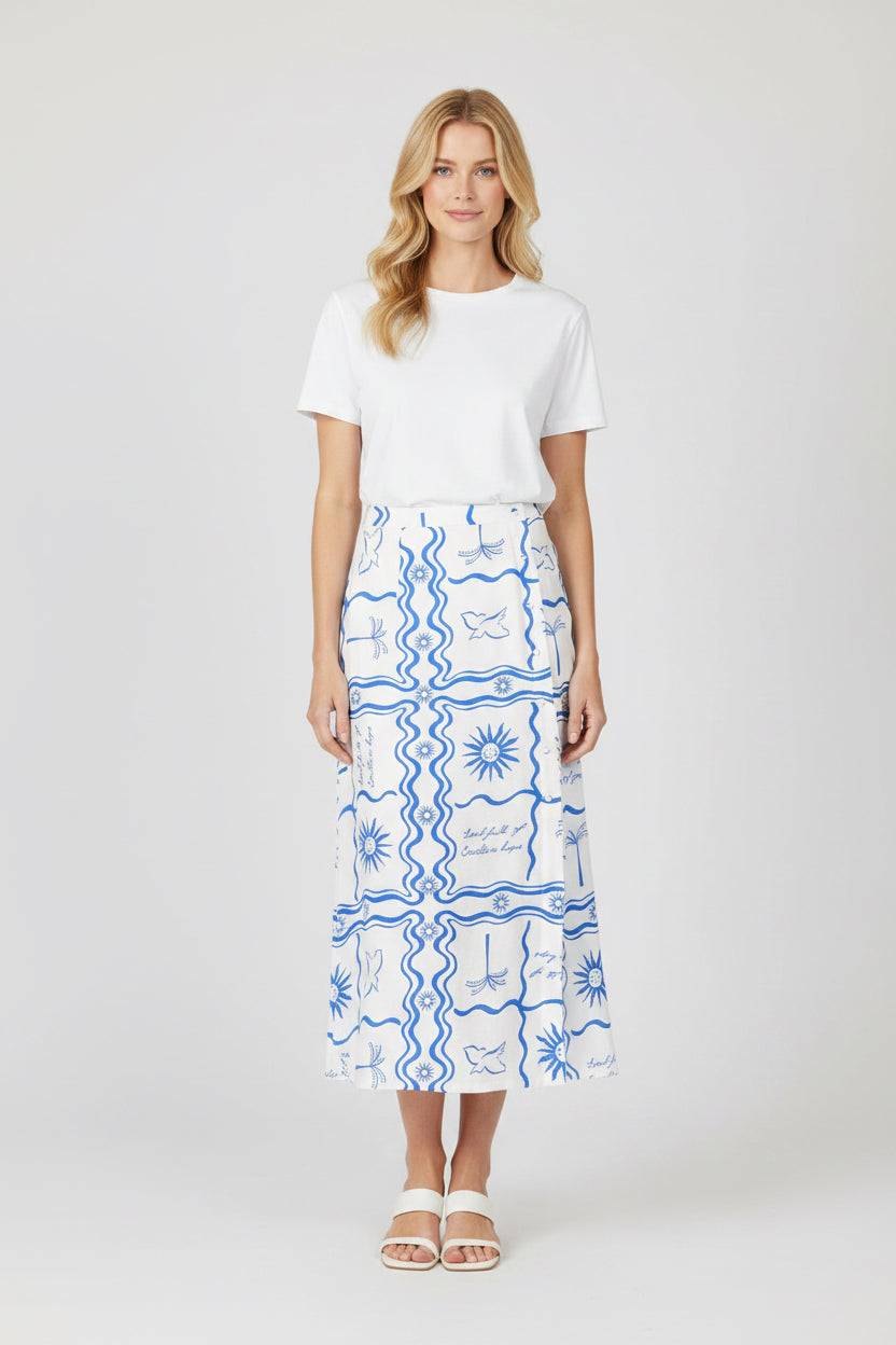 White skirt with blue abstract pattern on a white background