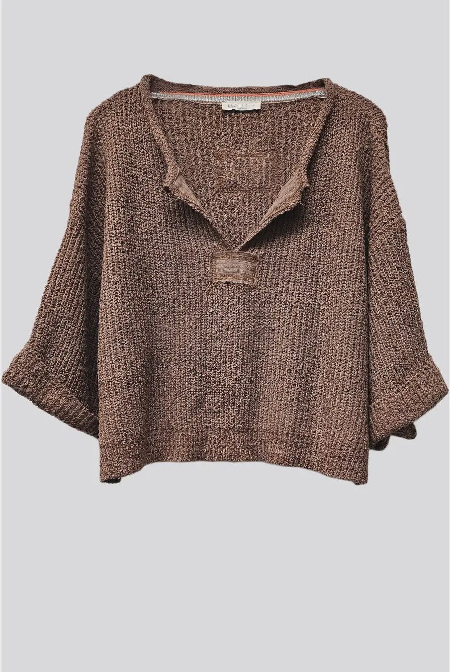 Women's slouchy cropped V-neck sweater in cocoa brown with 3/4 sleeves, a relaxed fit, and front and back patch detailing