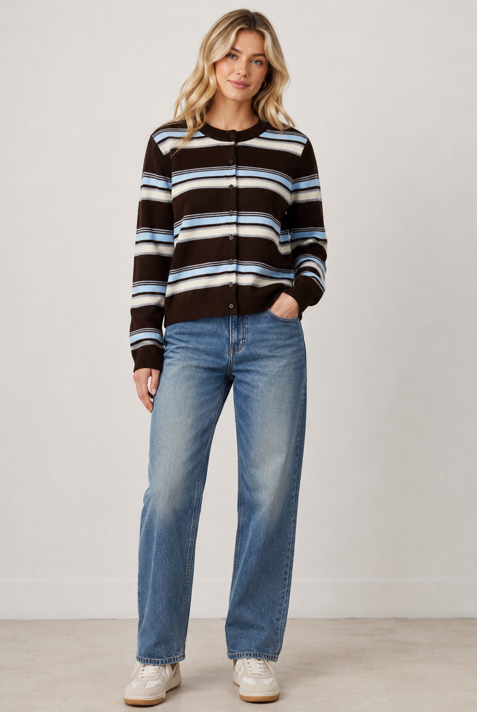 Brown and blue striped knit cardigan featuring a relaxed fit, soft textured fabrication, button-front closure, and a cozy layered design perfect for everyday styling.
