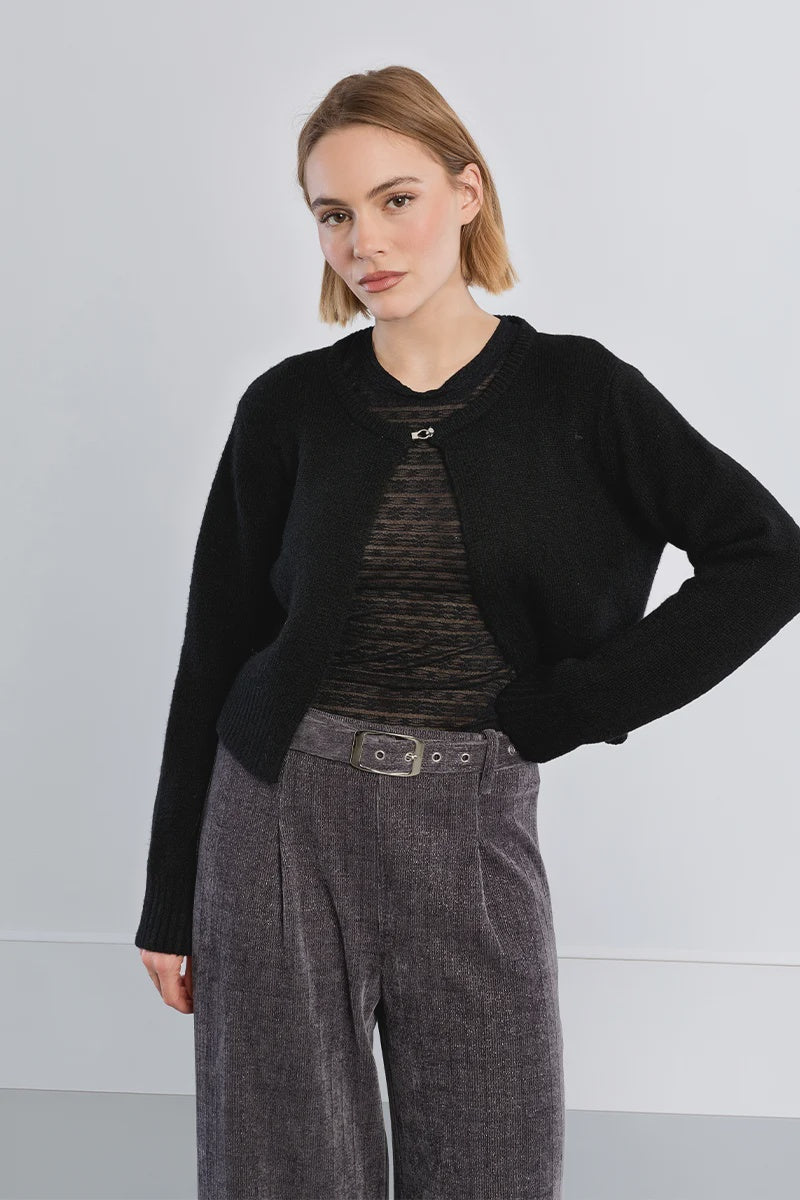Fluffy knit open cardigan featuring a round neckline, long sleeves, and rhinestone button closure at the upper front.