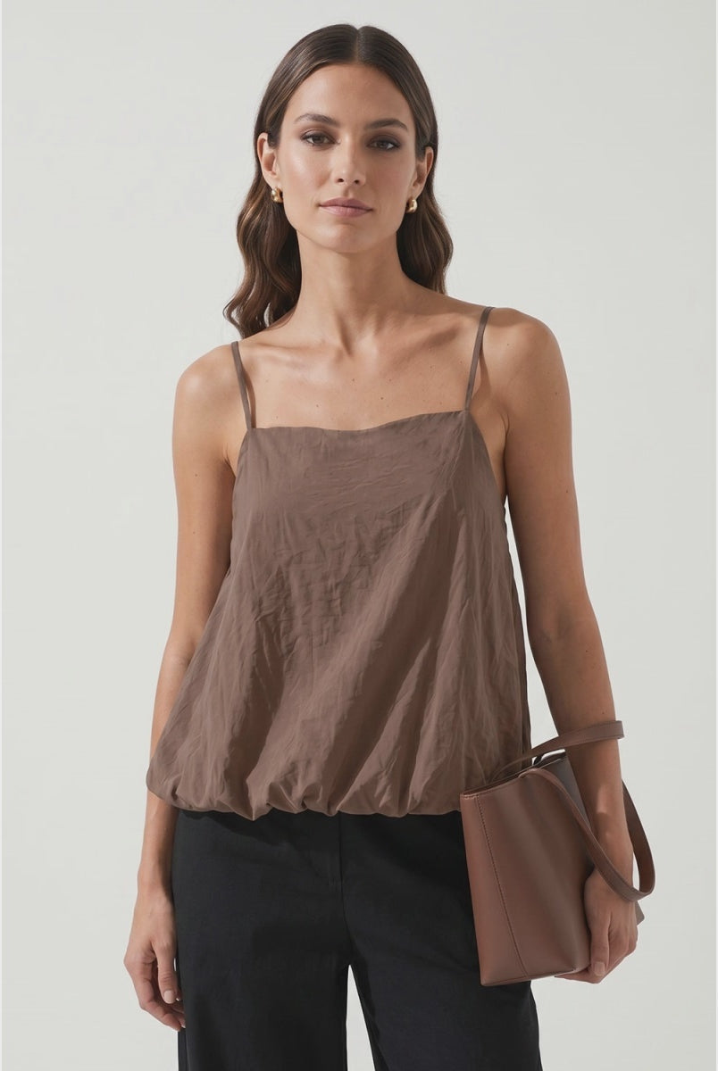 woman wearing a brown bubble hem tank top