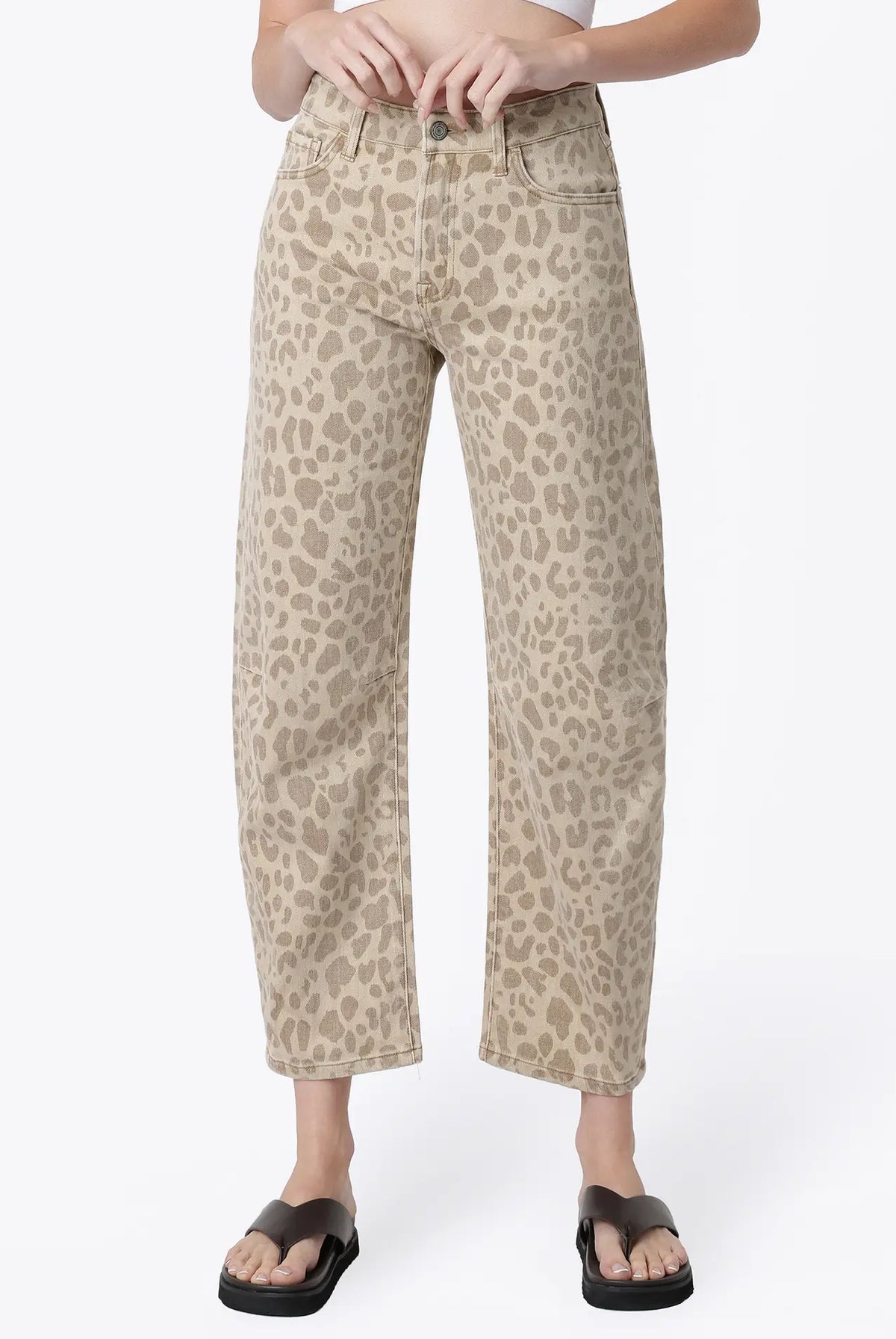 Women’s high-rise barrel jeans in a beige leopard print featuring a relaxed curved-leg fit, five-pocket styling, and cropped ankle length.