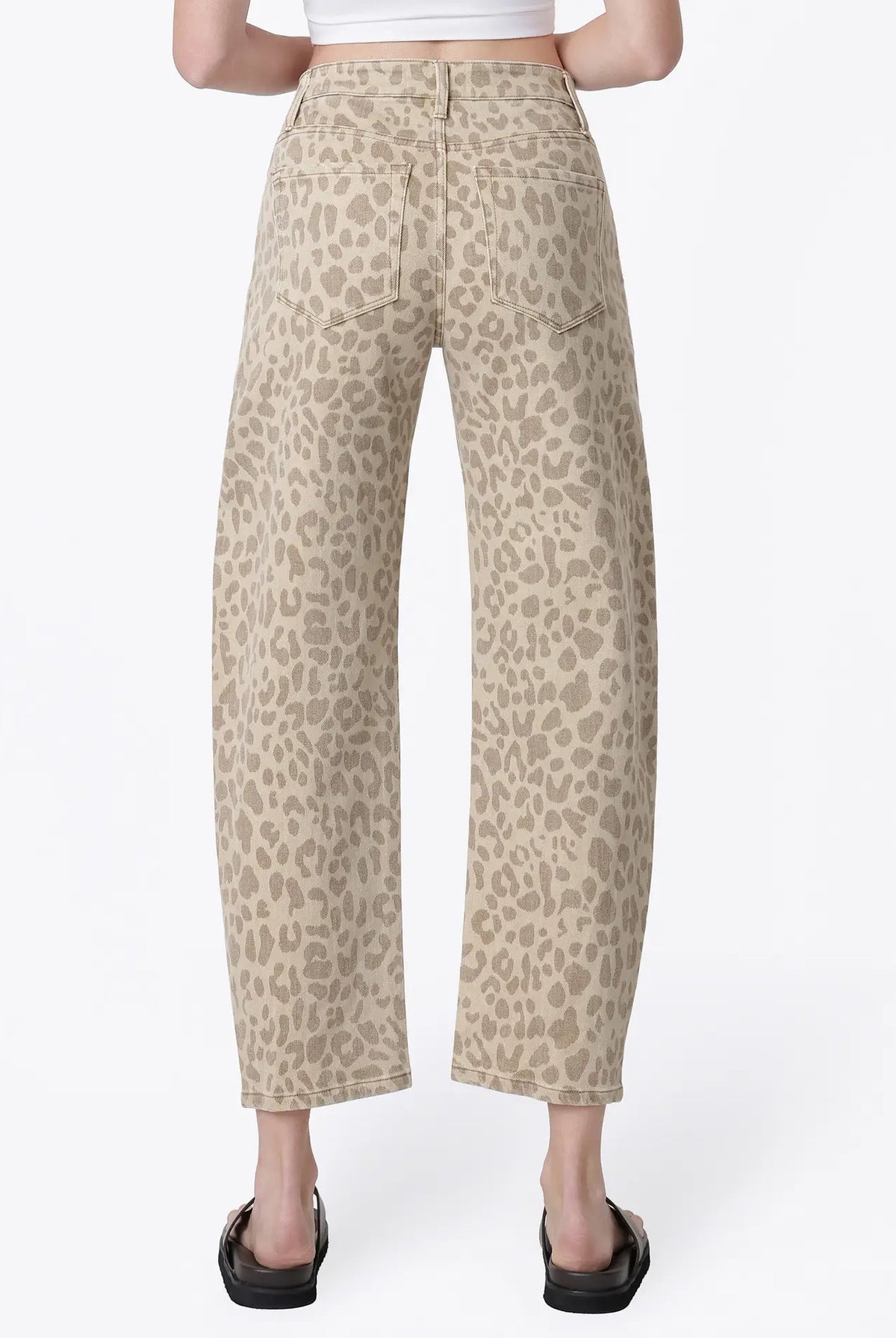 Women’s high-rise barrel jeans in a beige leopard print featuring a relaxed curved-leg fit, five-pocket styling, and cropped ankle length.