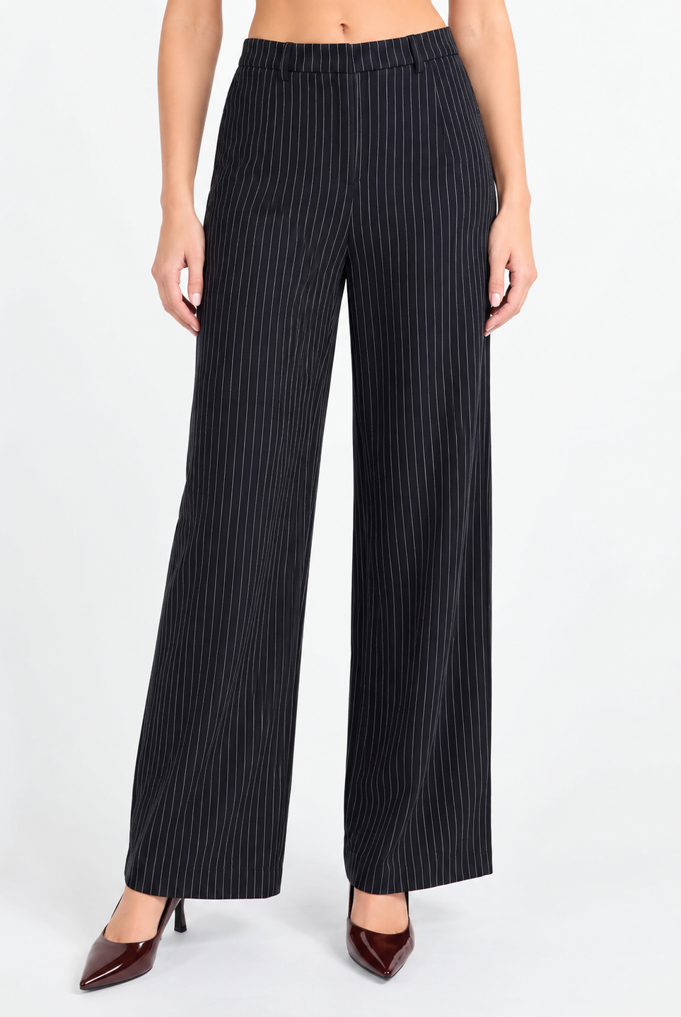 Sadie & Sage East Gate Pinstripe Pants featuring a flattering high-rise waist, relaxed wide-leg silhouette, and classic pinstripe pattern, designed to pair with the matching East Gate Pinstripe Waistcoat.
