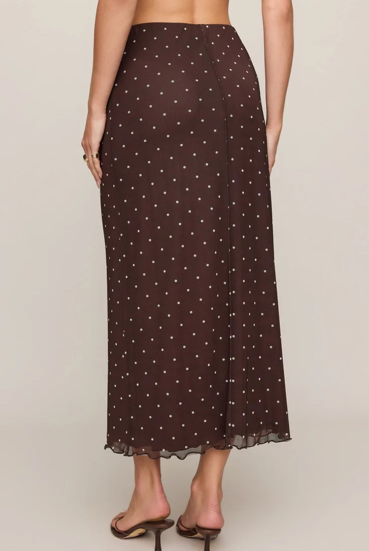 Brown mesh midi skirt with white polka dots, featuring a high-rise elastic waistband, lettuce-edge hem, and fully lined silhouette.