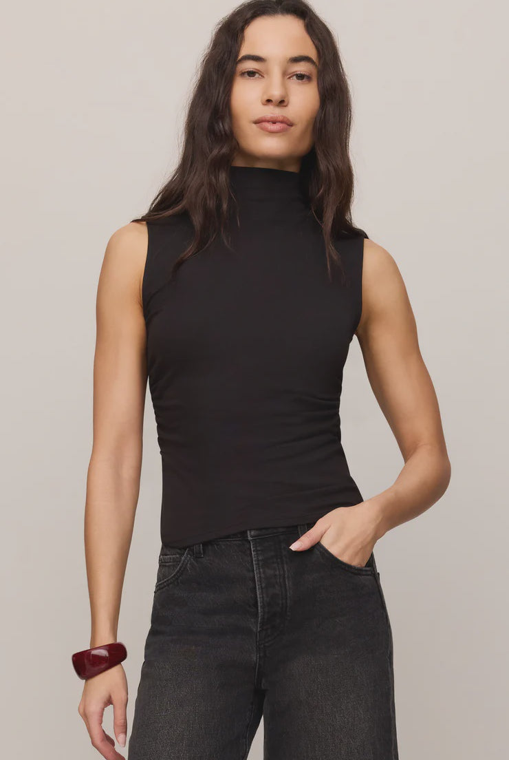 Close-fitting high-neck tank top in soft, stretchy baby rib fabric with subtle side ruching for a flattering, sculpted silhouette. A sleek, fitted essential that's perfect for layering or wearing on its own.