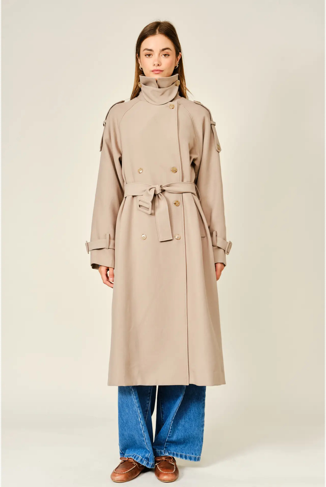 Monroe relaxed longline trench coat in soft, textured fabric, featuring a layered neckline, double-button front closure, and adjustable waist belt for a polished, sophisticated look.