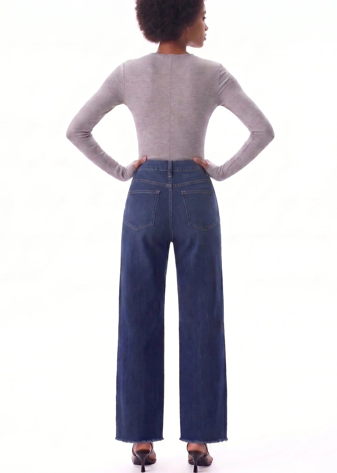 Bayeas New York high-rise wide-leg jeans featuring unique seaming, a flattering silhouette, and raw-edge hem for a modern, effortlessly edgy look.