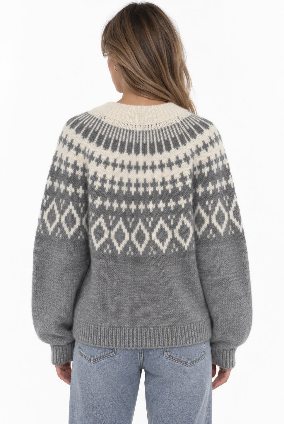 The Brielle Knit Pullover is your new go-to for cozy days. Designed in a soft grey knit with a contrasting cream Nordic-inspired pattern, it features a relaxed fit, classic crew neckline, and easy long sleeves. The perfect statement knit to throw on with denim for an effortlessly put-together fall and winter look.