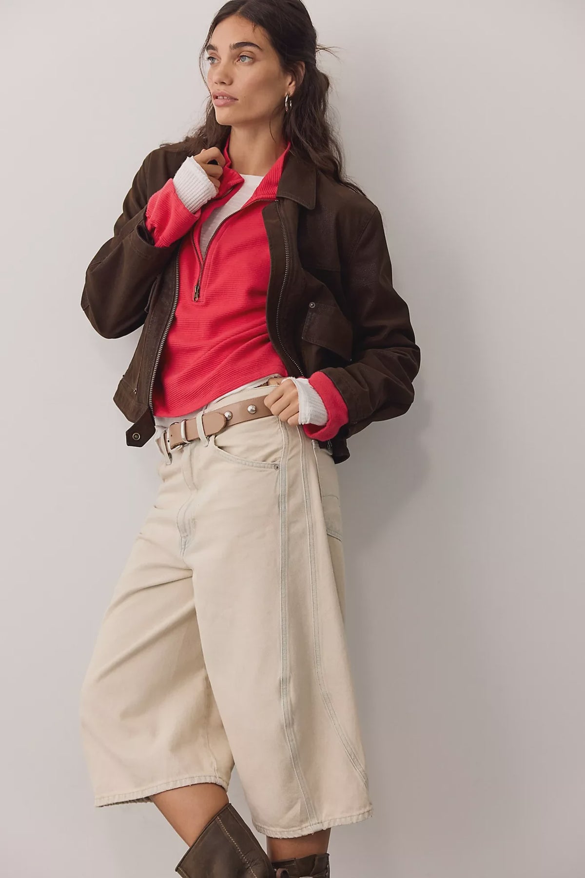 Soft 100% cotton quarter-zip pullover with a slightly cropped, boxy fit, dropped shoulders, long sleeves, and stand collar.