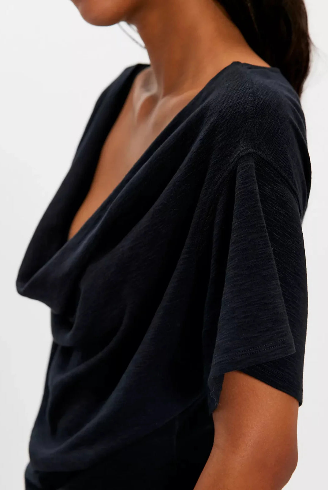 black cowl neck top. mid - full length and loose fitted short sleeves