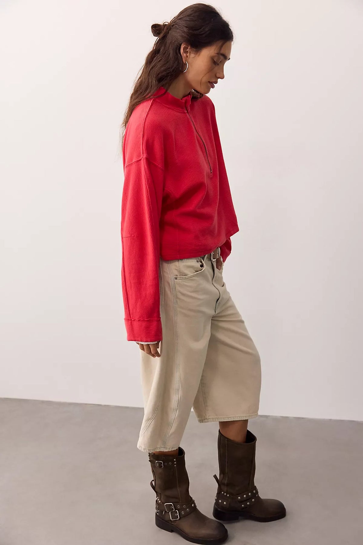 Soft 100% cotton quarter-zip pullover with a slightly cropped, boxy fit, dropped shoulders, long sleeves, and stand collar.