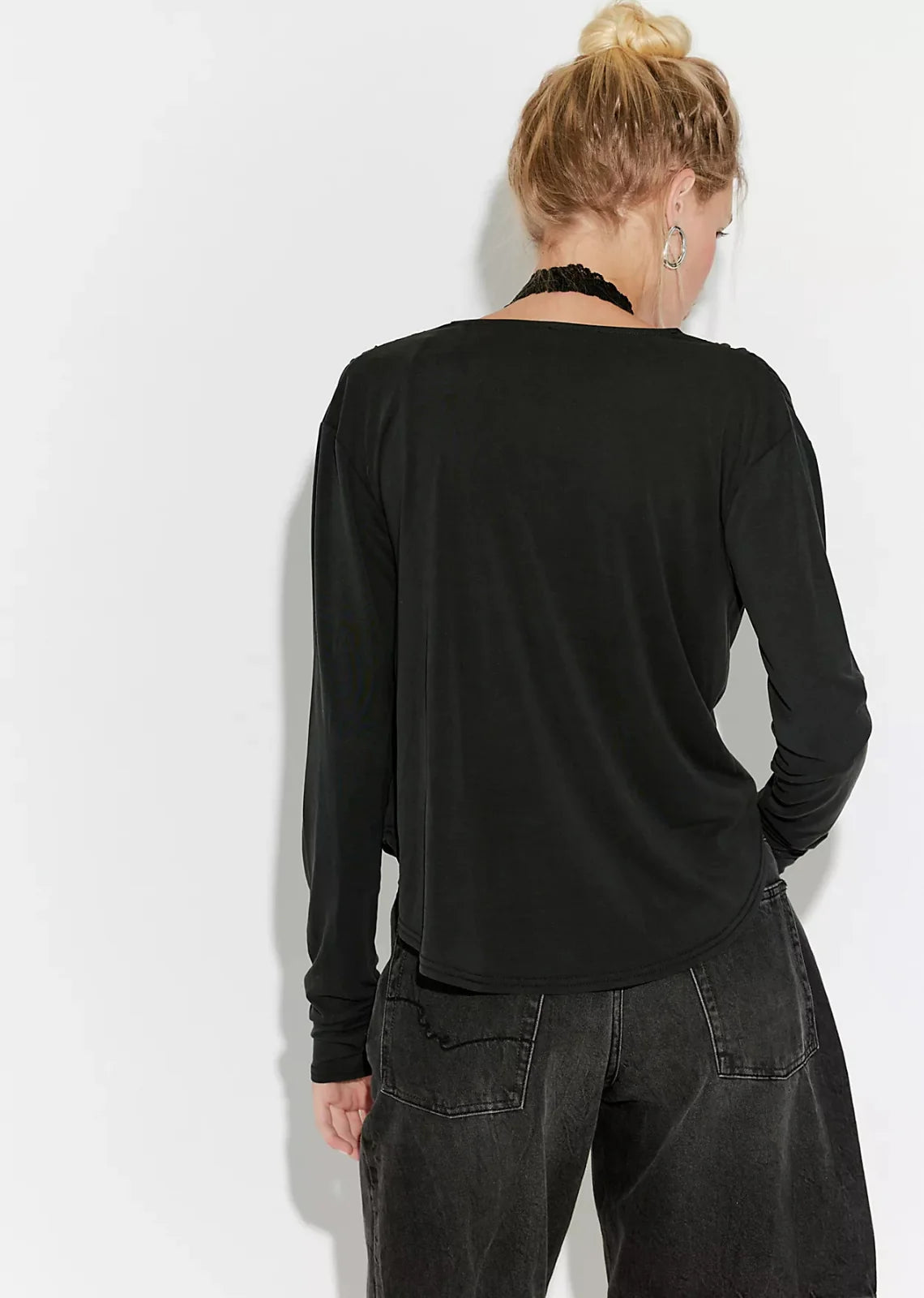 Jane Long Sleeve top featuring a soft, draped cowl neckline that can be styled off the shoulder, long fitted sleeves, and a flattering, body-skimming silhouette with an effortlessly feminine look.