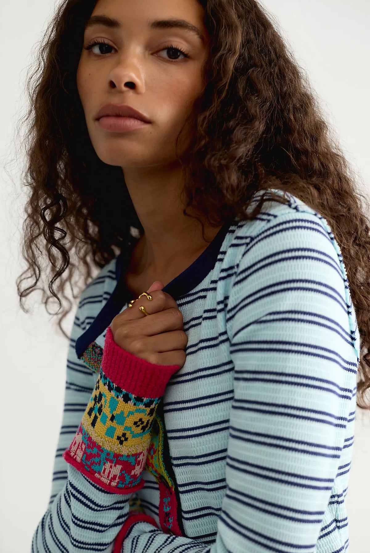 Free People Noa Cardi in Blue Pop Combo featuring a fitted silhouette, soft ribbed cotton fabric, blue and white horizontal stripes, crew neckline, long sleeves, button-front closure, and colourful embroidered detailing along the front panels and cuffs.