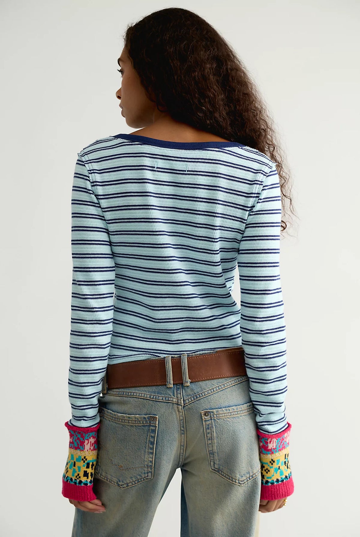 Free People Noa Cardi in Blue Pop Combo featuring a fitted silhouette, soft ribbed cotton fabric, blue and white horizontal stripes, crew neckline, long sleeves, button-front closure, and colourful embroidered detailing along the front panels and cuffs.