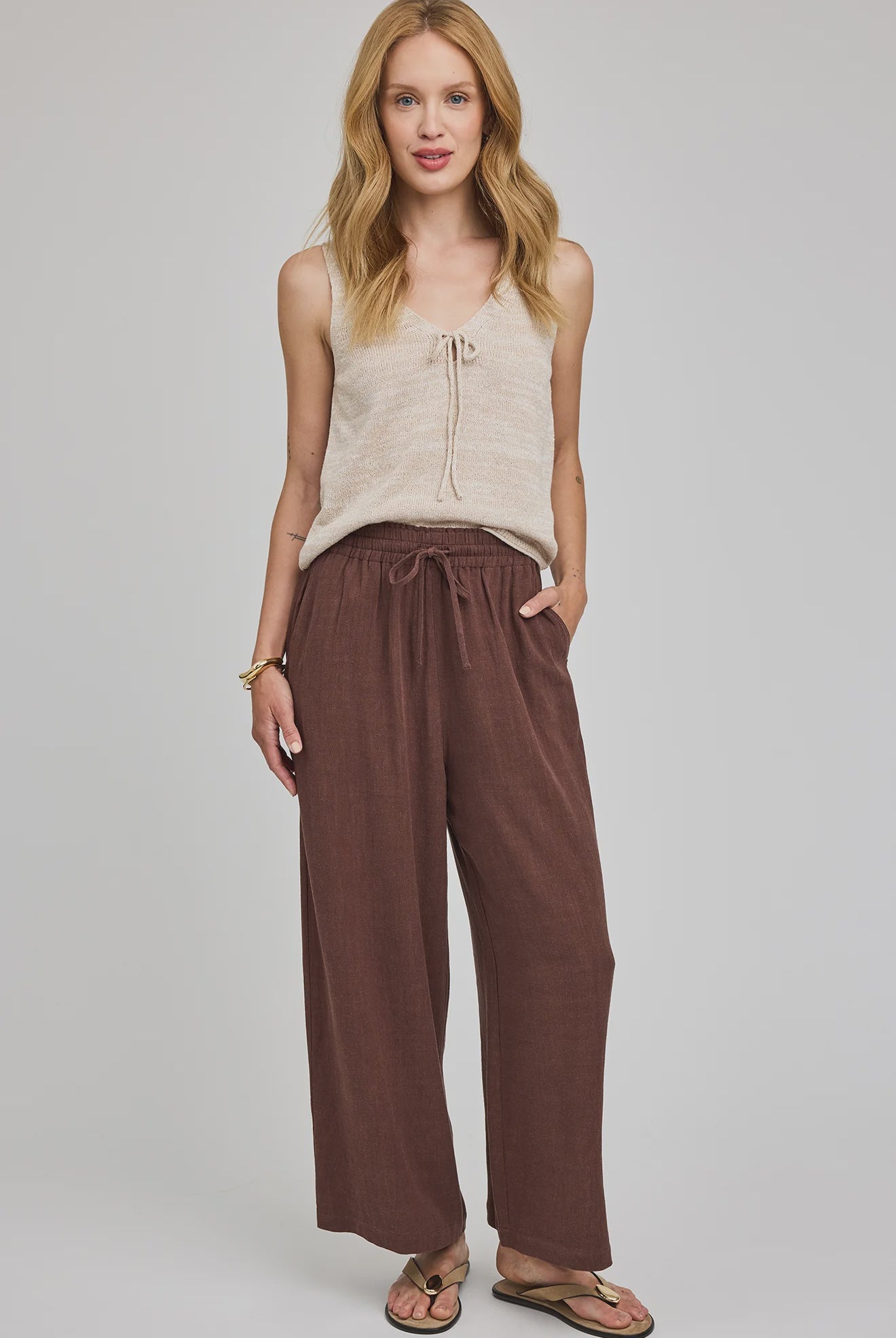 Espresso coloured ankle length linen and rayon blend pants. Drawstring and elastic waistband. Front Pockets.