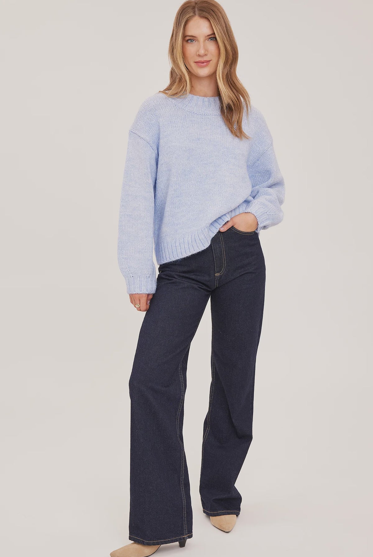 Tova sweater in a soft heathered knit with an oversized crew neckline, relaxed fit, and perfectly cropped length. Available in Heather Pebble and Heather Skyline.