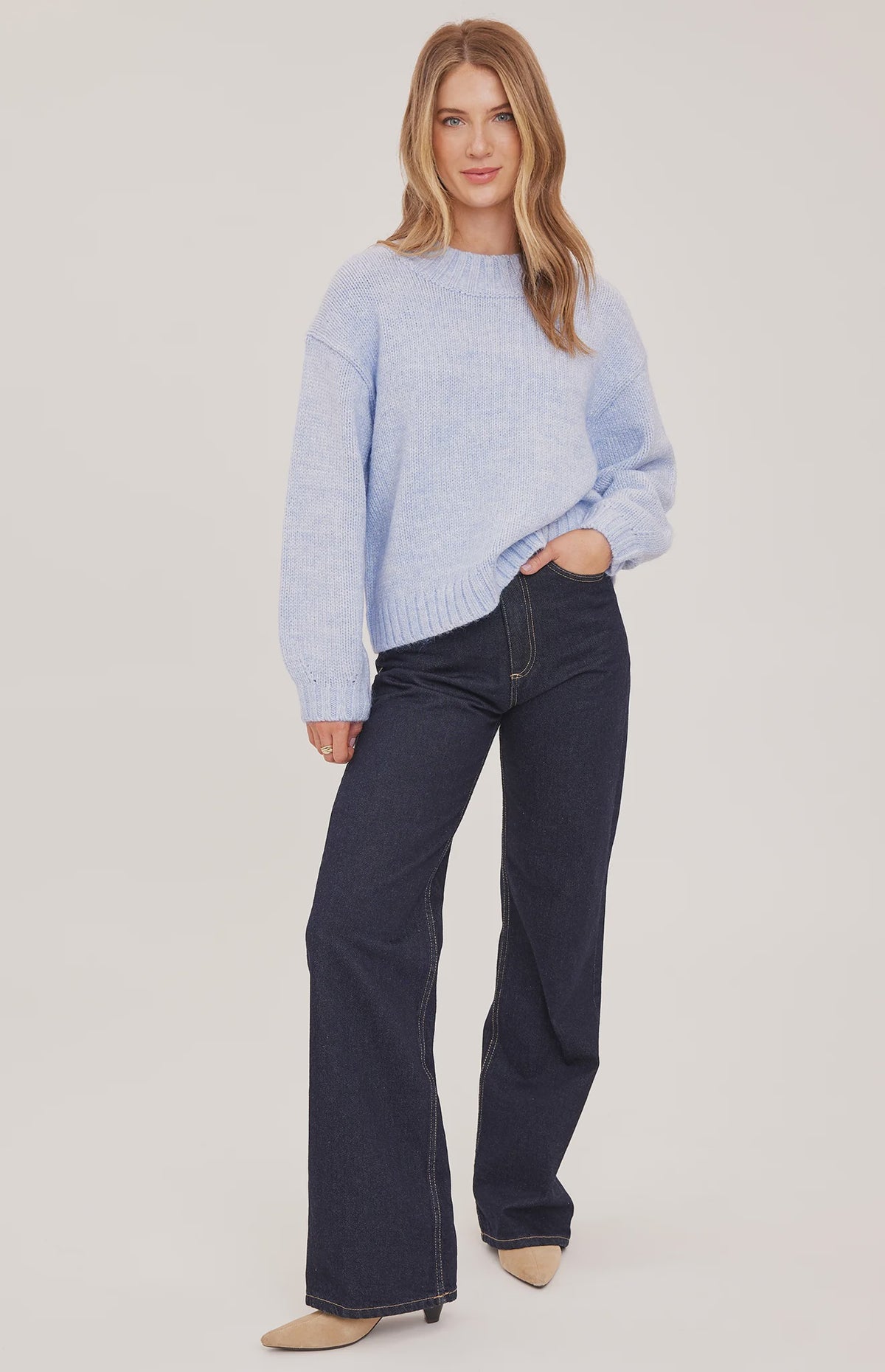 Tova sweater in a soft heathered knit with an oversized crew neckline, relaxed fit, and perfectly cropped length. Available in Heather Pebble and Heather Skyline.