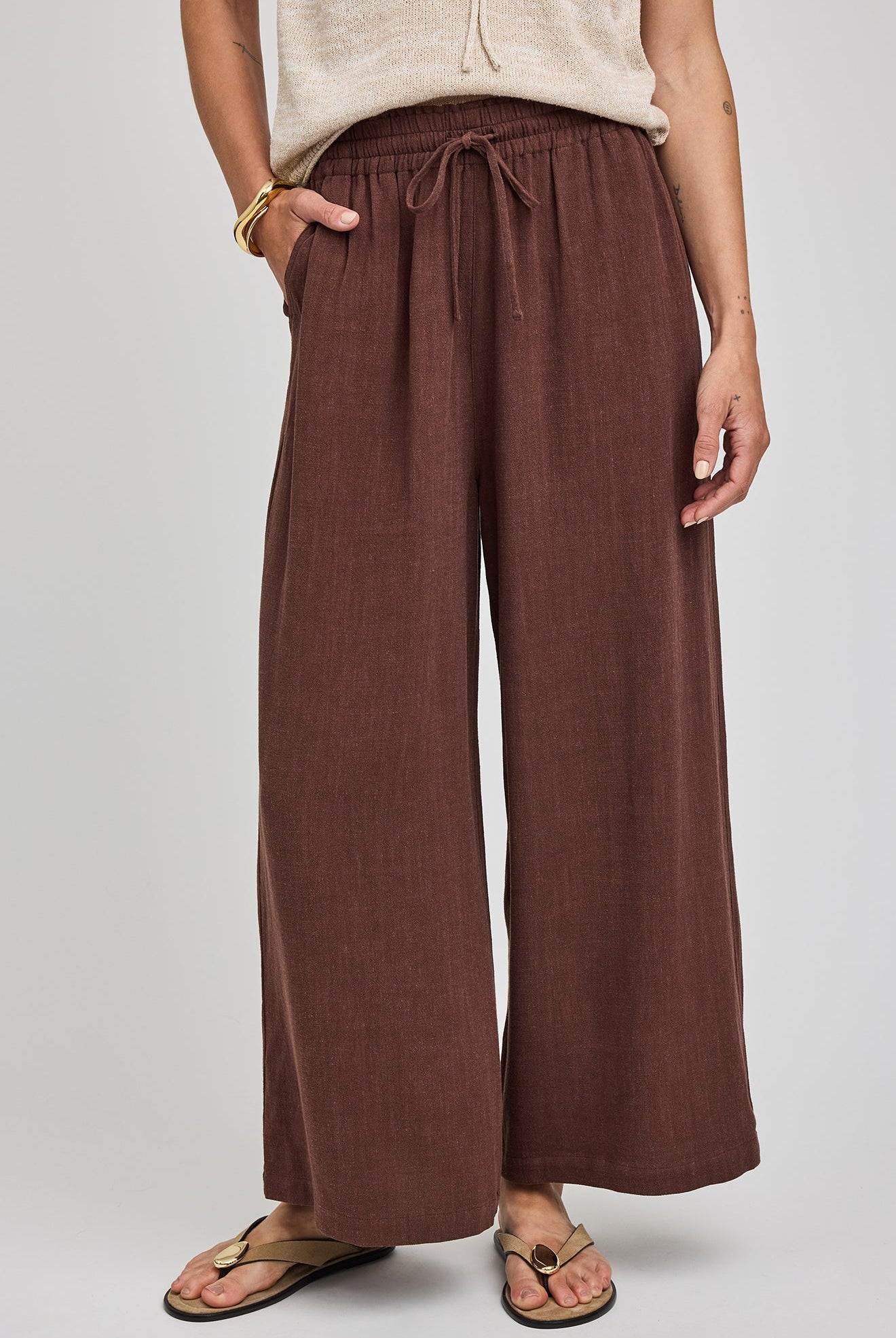 Espresso coloured ankle length linen and rayon blend pants. Drawstring and elastic waistband. Front Pockets.