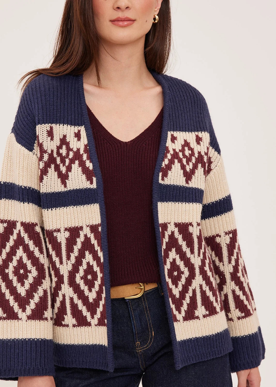 Dorian cardigan in soft, cozy yarn featuring a custom jacquard pattern and relaxed fit.