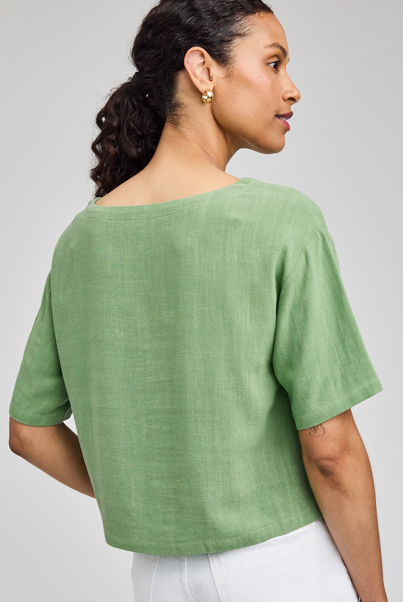 Jade Green Gemini top in a lightweight rayon-linen blend featuring a boat neckline, side slits, and a relaxed, easy-to-style silhouette.