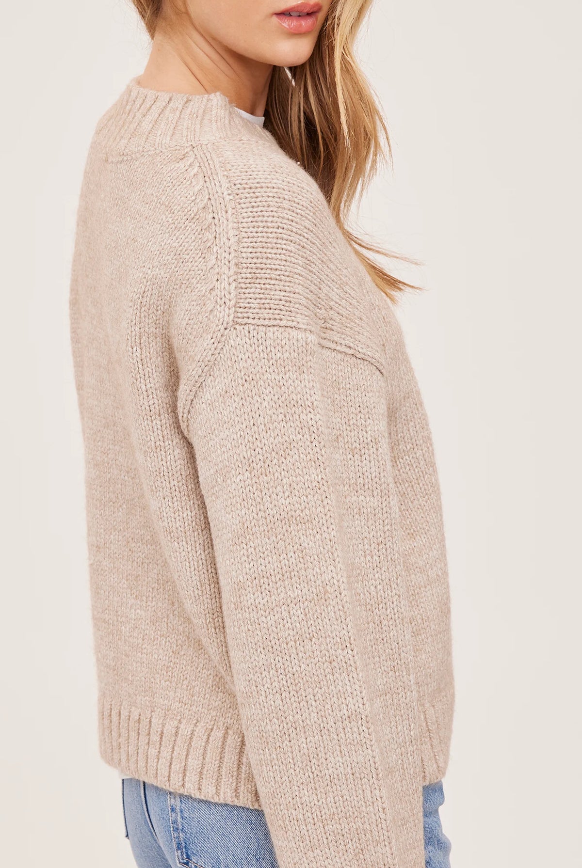Tova sweater in a soft heathered knit with an oversized crew neckline, relaxed fit, and perfectly cropped length. Available in Heather Pebble and Heather Skyline.