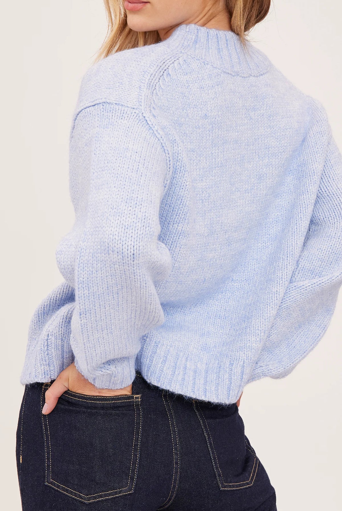 Tova sweater in a soft heathered knit with an oversized crew neckline, relaxed fit, and perfectly cropped length. Available in Heather Pebble and Heather Skyline.