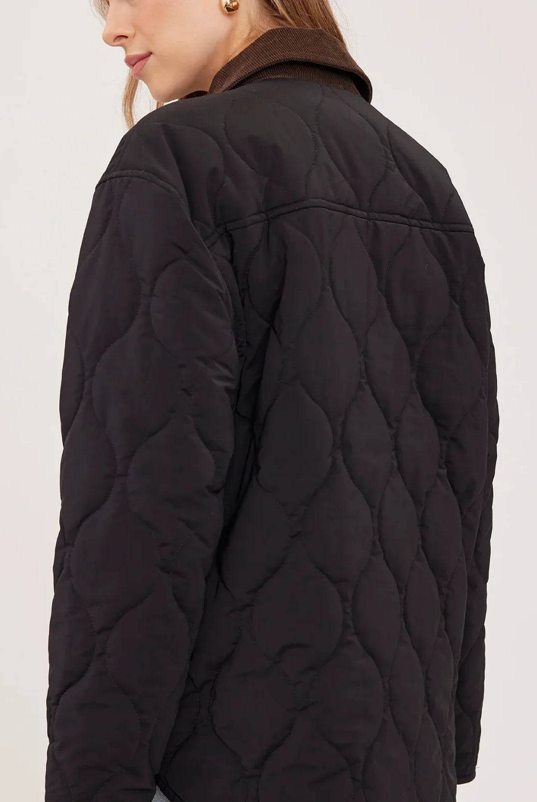 Felix relaxed-fit quilted jacket in brushed nylon, featuring a contrast corduroy collar and dual-entry pockets.