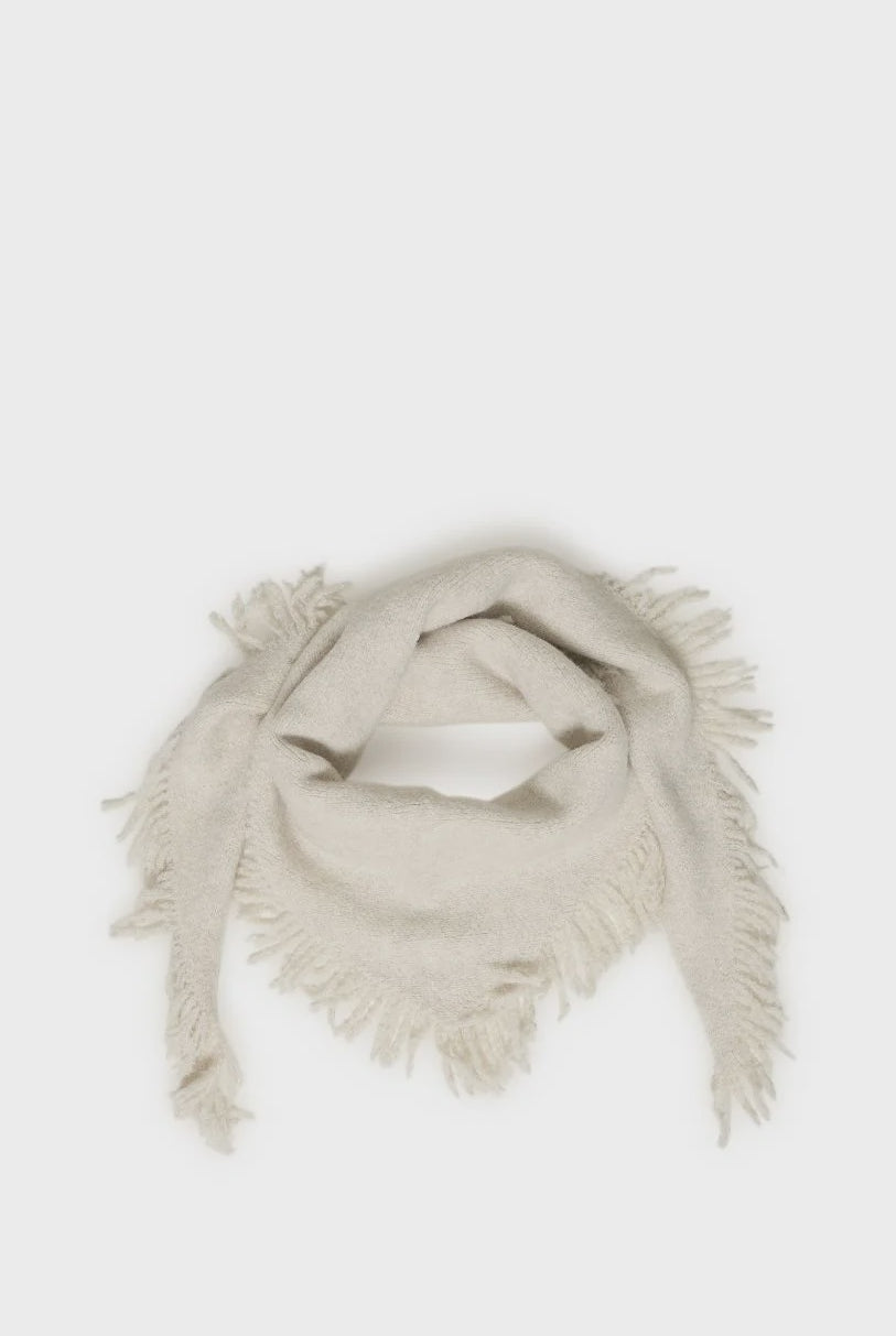 Soft cream triangle scarf with a lightly brushed texture, fringe trim, and versatile drape.