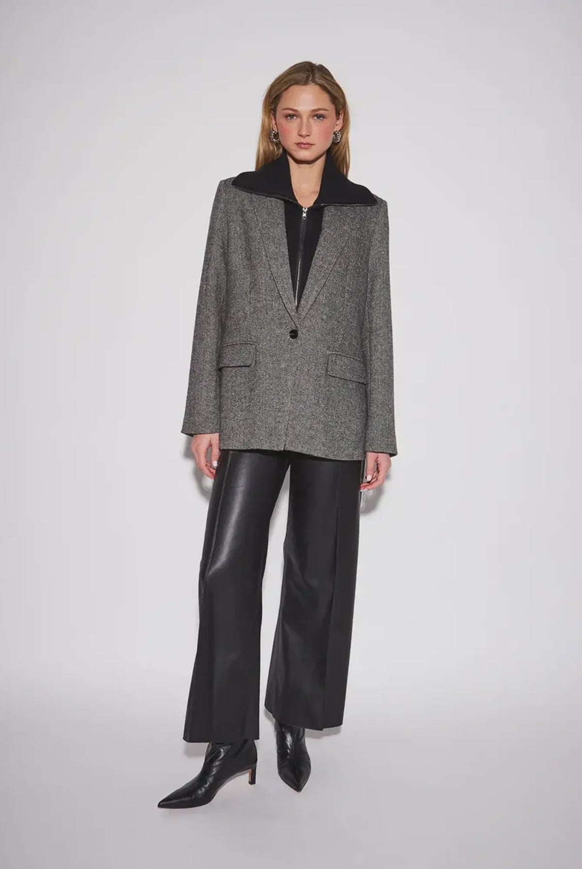 John & Jenn Hayes Blazer featuring a classic herringbone pattern, structured fit, elongated silhouette, and subtle texture for a polished, menswear-inspired look.