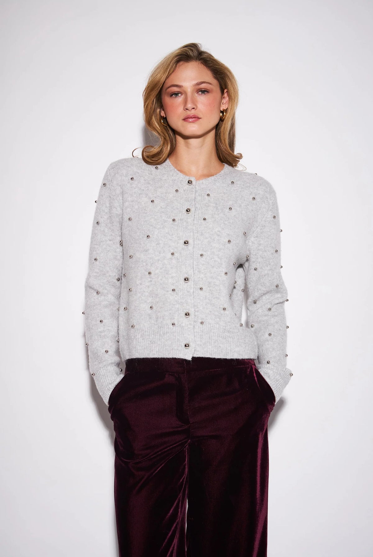 John & Jenn Sullivan Cardigan in Silver Bells featuring a classic crew neckline, button-front closure, long sleeves, and silver ball stud detailing throughout for a chic, polished look.