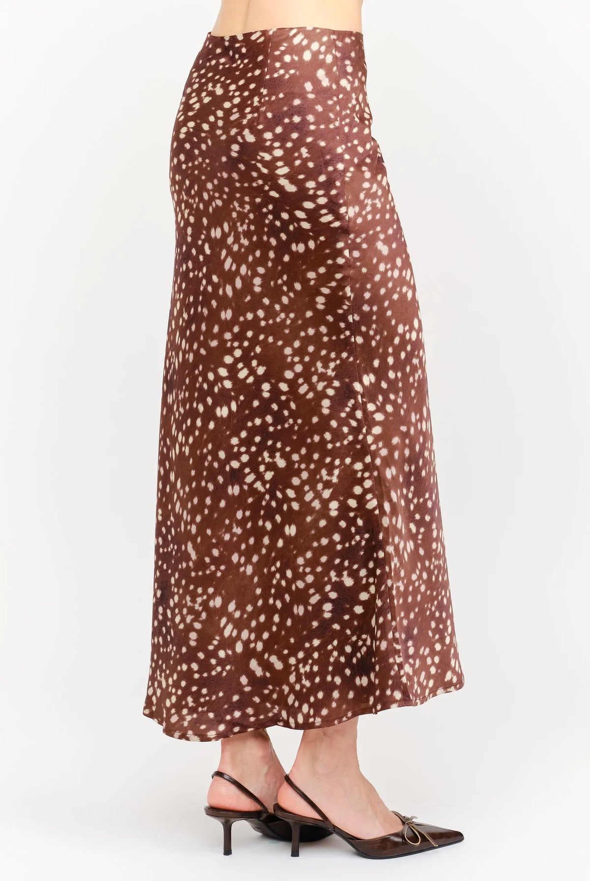 Kalila Midi Skirt in soft brown featuring a white deer print, flattering mermaid silhouette, and flowing ankle-length hem.