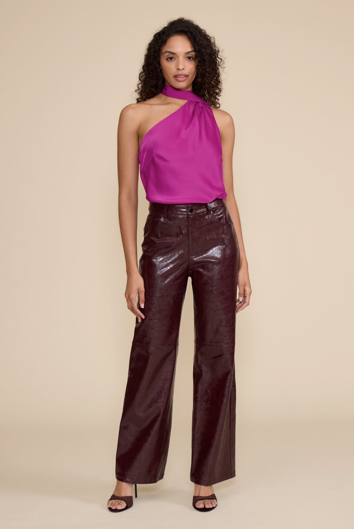 Cleo Faux Leather Pant in wine featuring a high-rise waist, straight-leg fit, and glossy faux leather finish.