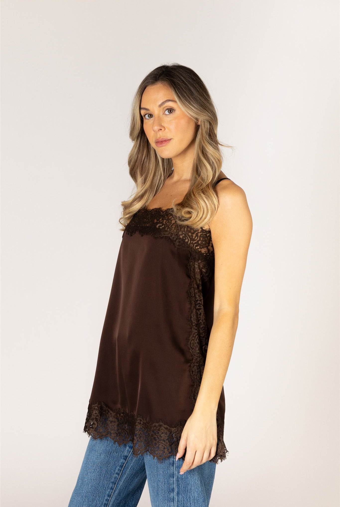 Chocolate brown lace trim camisole top with delicate lace detailing at the neckline and hem.