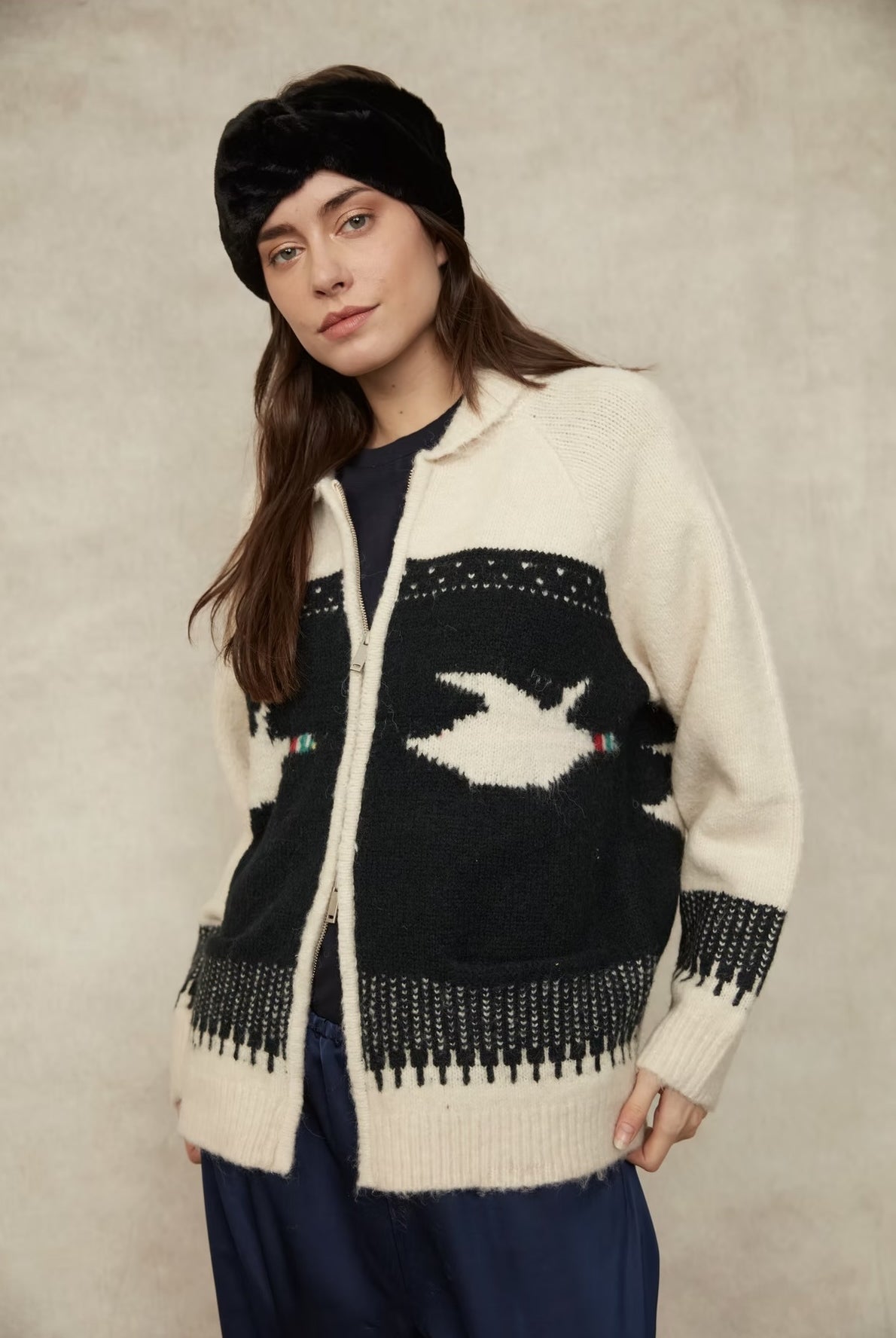 Mallard Zip-Up Cardigan in an ivory and black knit with a contrasting duck motif, collared neckline, button-front closure, long sleeves, and a relaxed fit with patterned detailing throughout.