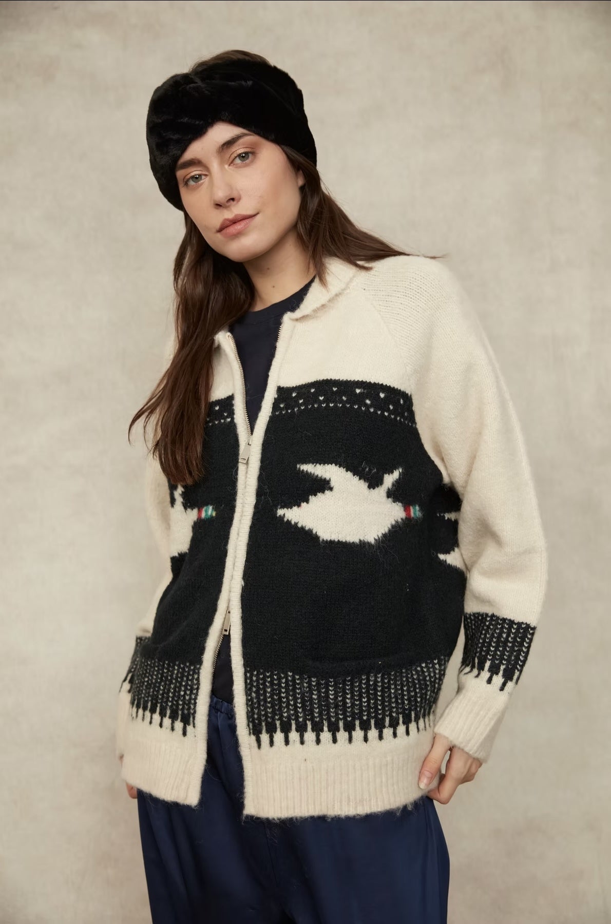 Mallard Zip-Up Cardigan in an ivory and black knit with a contrasting duck motif, collared neckline, button-front closure, long sleeves, and a relaxed fit with patterned detailing throughout.