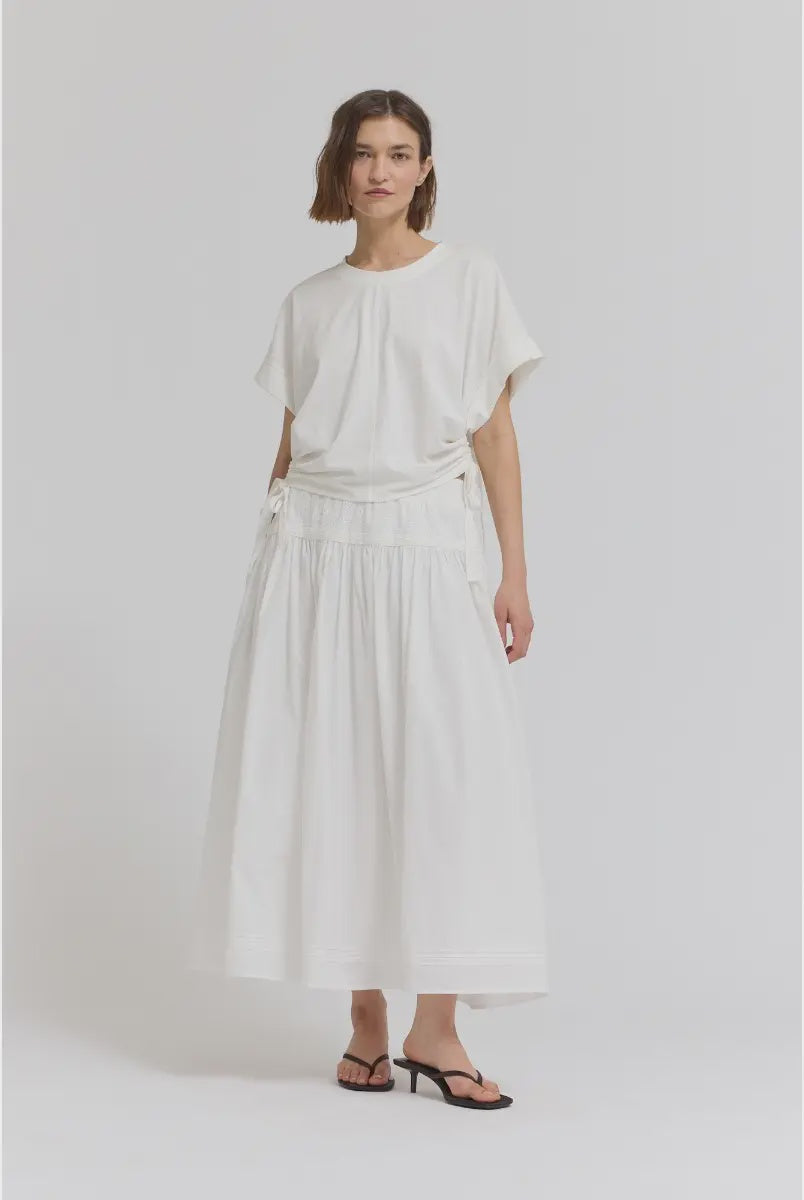 Side scrunch tee with adjustable ruched detailing along the side, creating a flattering contoured silhouette with a comfortable, easy fit.