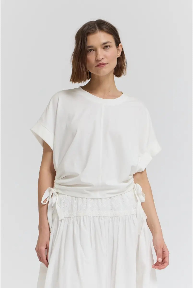 Side scrunch tee with adjustable ruched detailing along the side, creating a flattering contoured silhouette with a comfortable, easy fit.