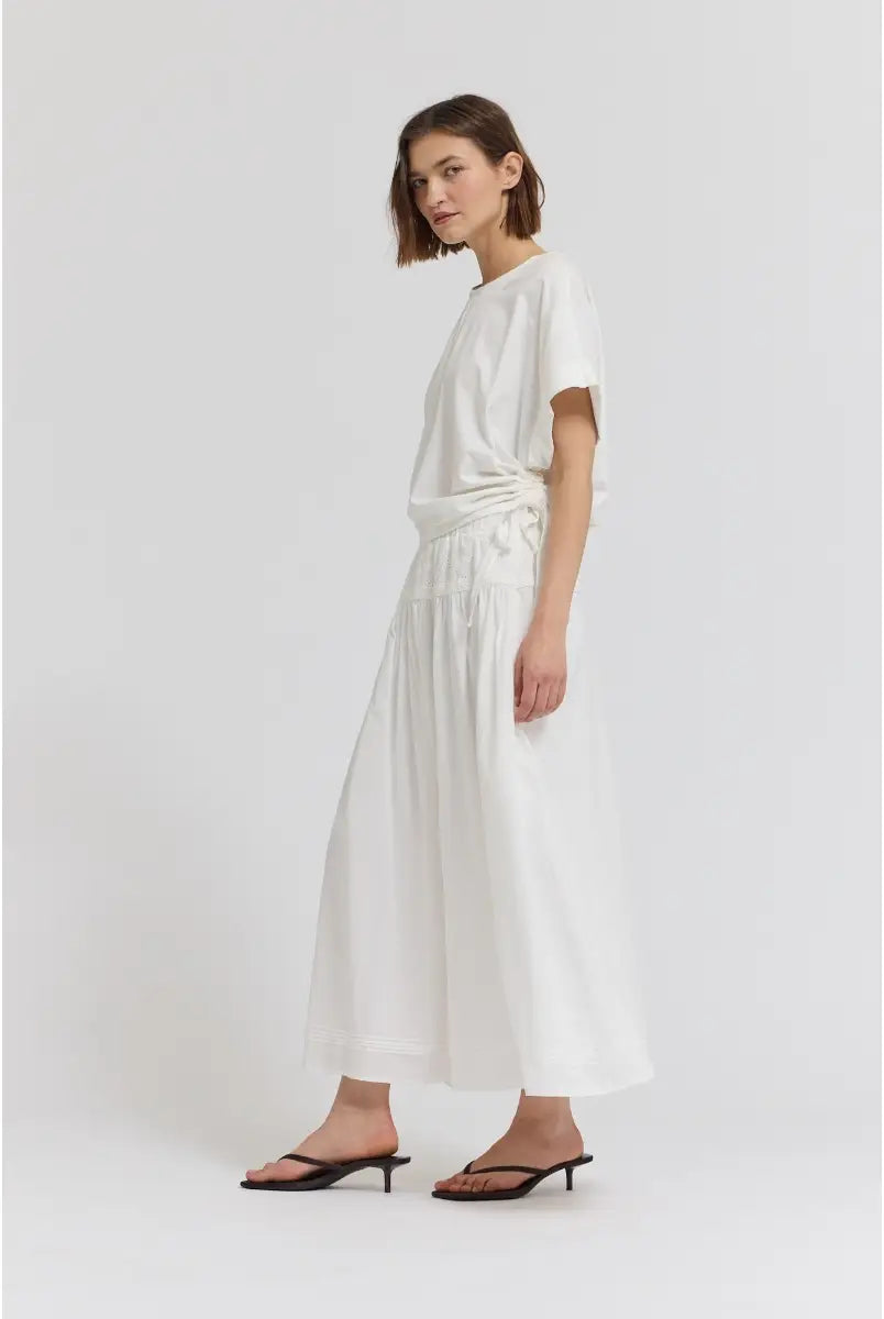Side scrunch tee with adjustable ruched detailing along the side, creating a flattering contoured silhouette with a comfortable, easy fit.