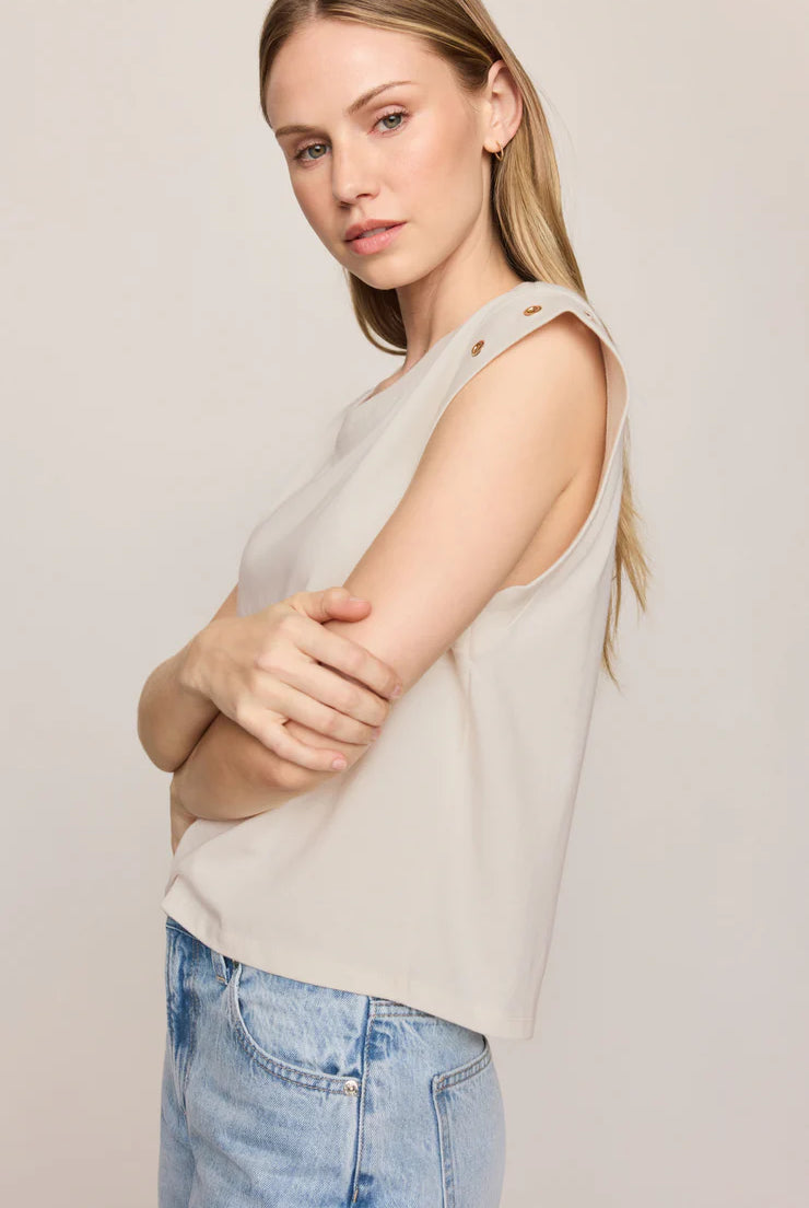 Relaxed muscle tee in soft cotton-blend jersey with gold metal grommet details at the arm openings. An elevated everyday basic with an effortless drape and versatile, modern silhouette.