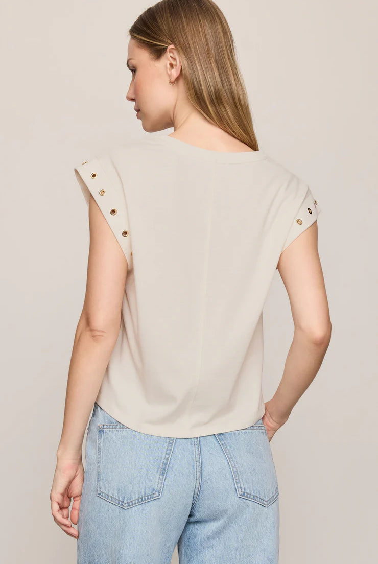Relaxed muscle tee in soft cotton-blend jersey with gold metal grommet details at the arm openings. An elevated everyday basic with an effortless drape and versatile, modern silhouette.